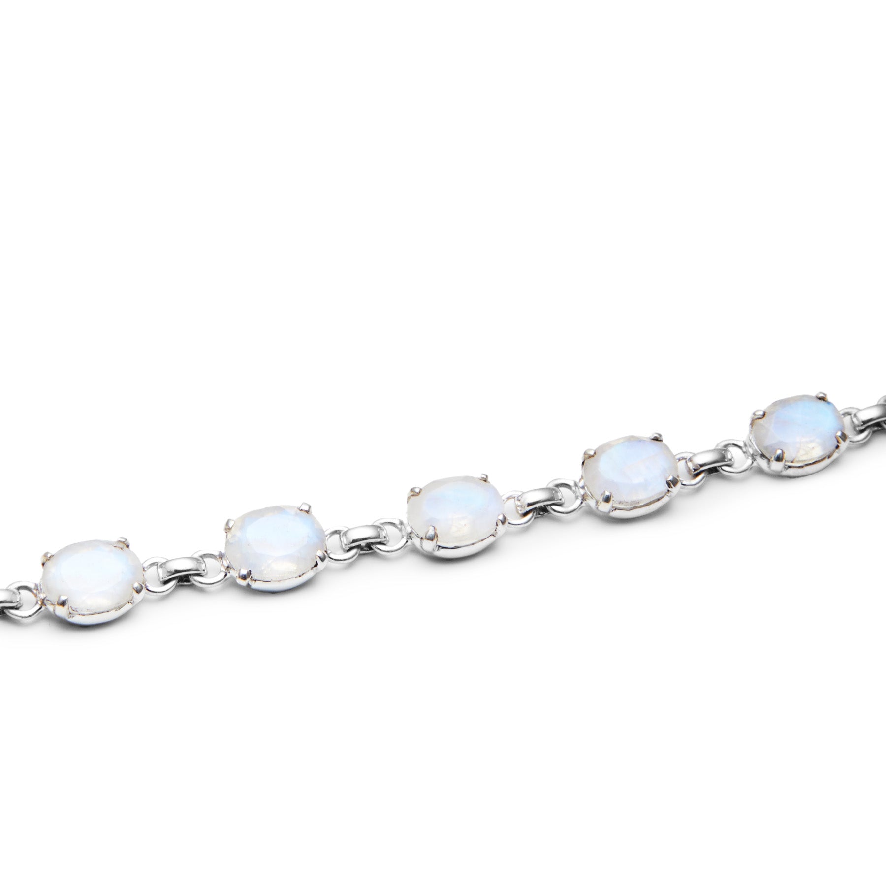 Silver bracelet with moonstones on a white background.