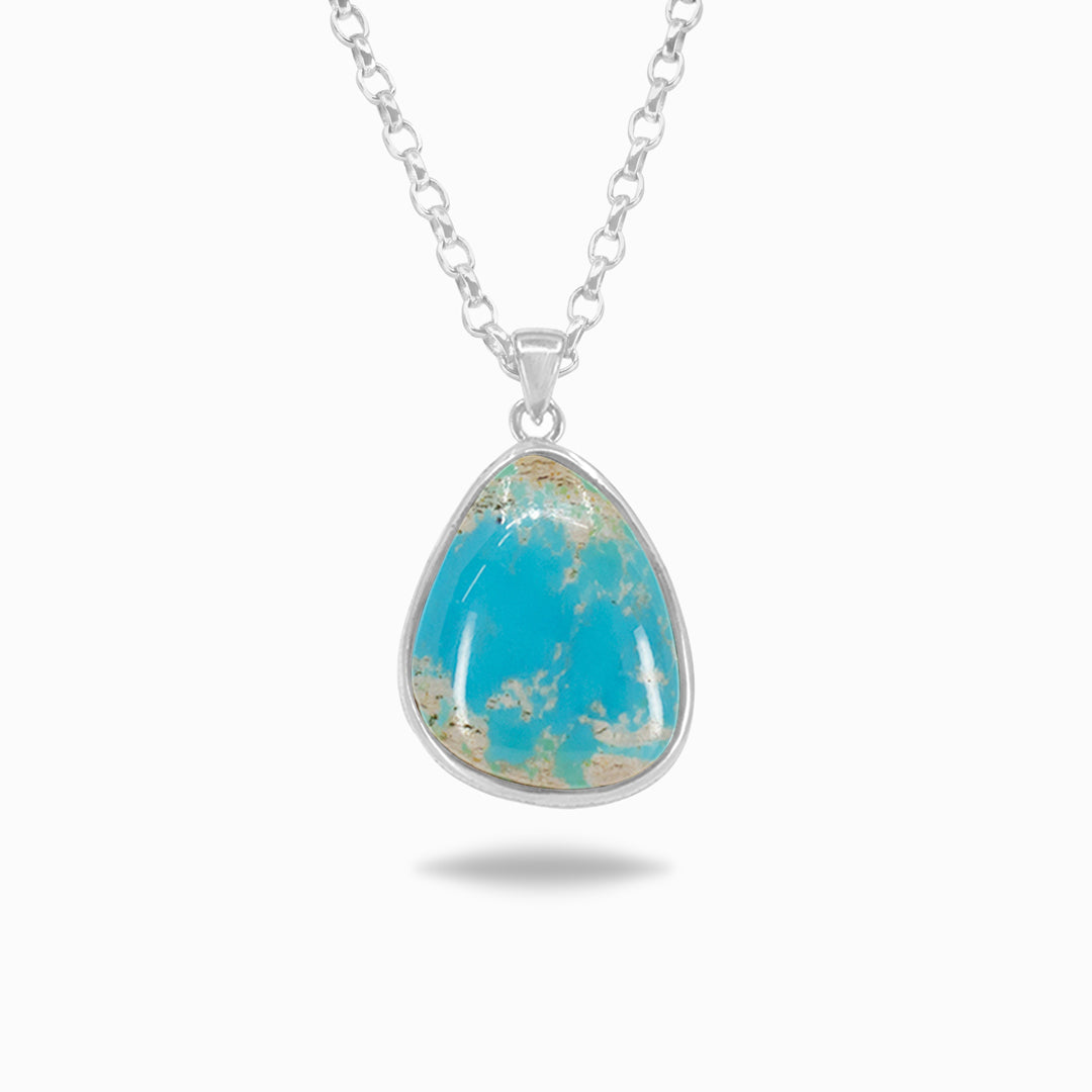 Turquoise pendant necklace on a white background