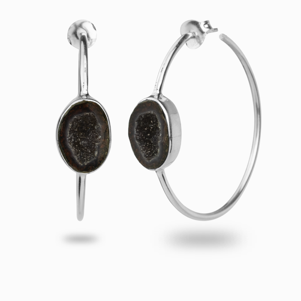 Dark agate geodes embedded in stud hoops with hints of red and green