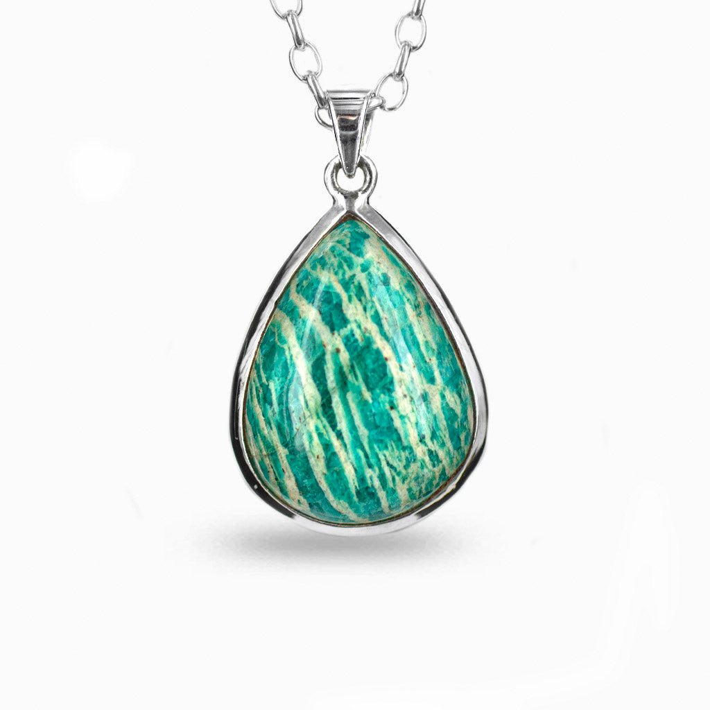 Teal blue with cream diagonal lines, teardrop shape, cabochon cut, 925 sterling silver bezel setting on a 925 sterling silver chain.