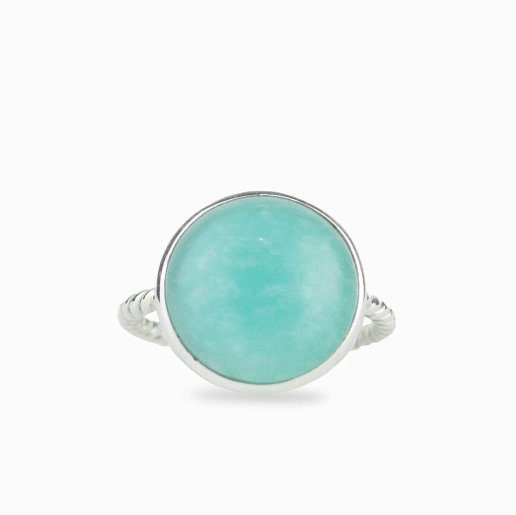 sky blue, round, cabochon cut, 925 sterling silver bezel set with a twisted band