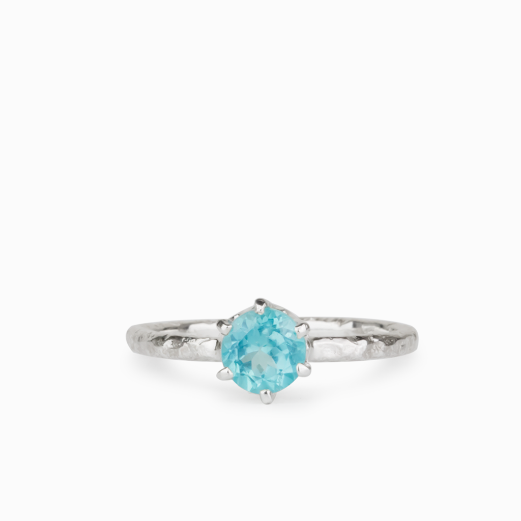 Apatite faceted, textured band ring. 